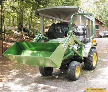 john deere 655 compact tractor loader bucket front view